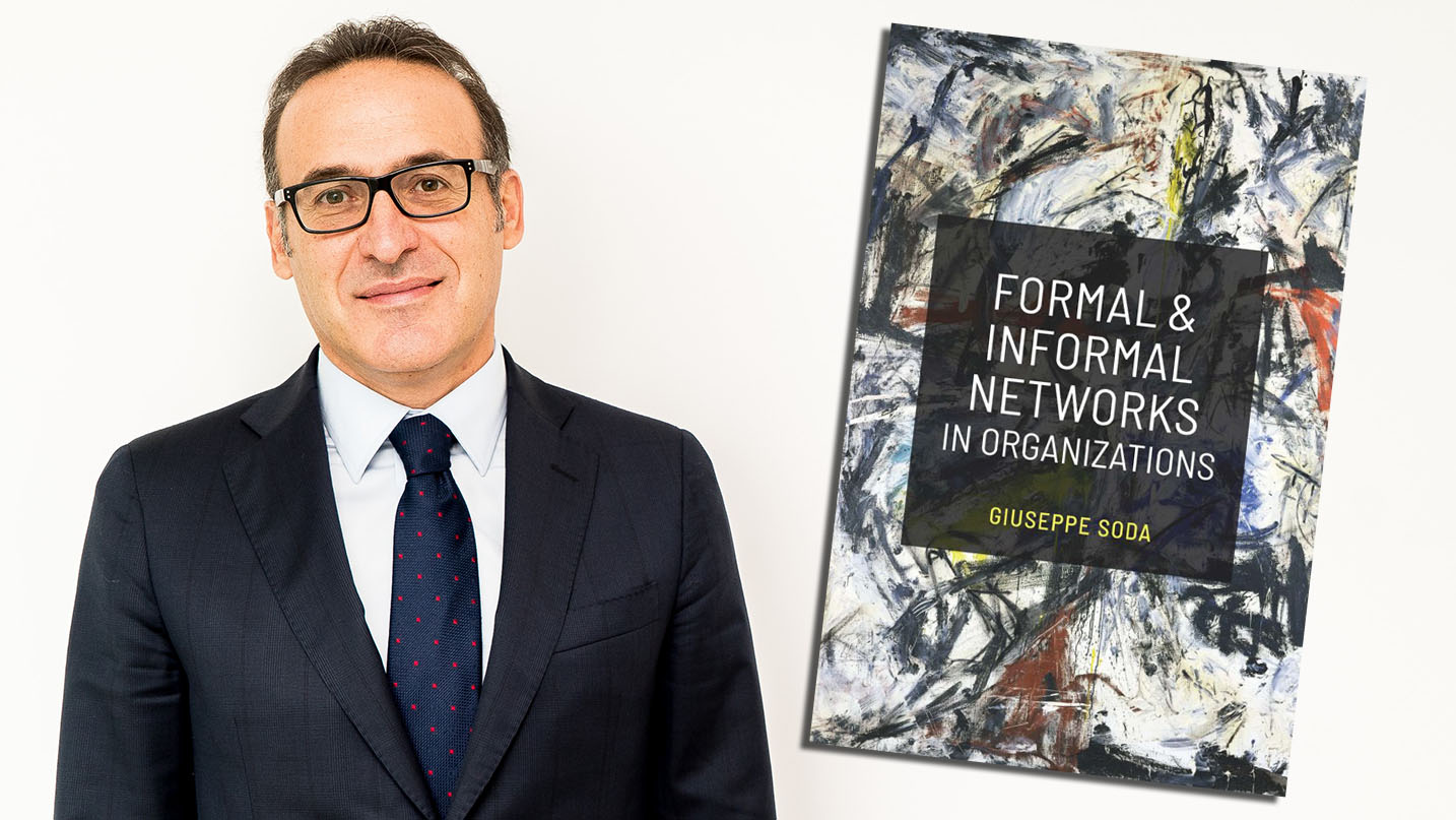 Giuseppe Soda next to the cover of his book Formal and Informal Networks in Organizations